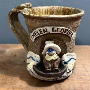 Helen Georgia hand crafted mug clay cup bear dog in boat rapids rustic cabin